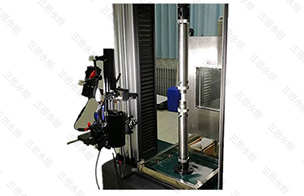 What is the function of the extensometer on the electronic universal testing machine